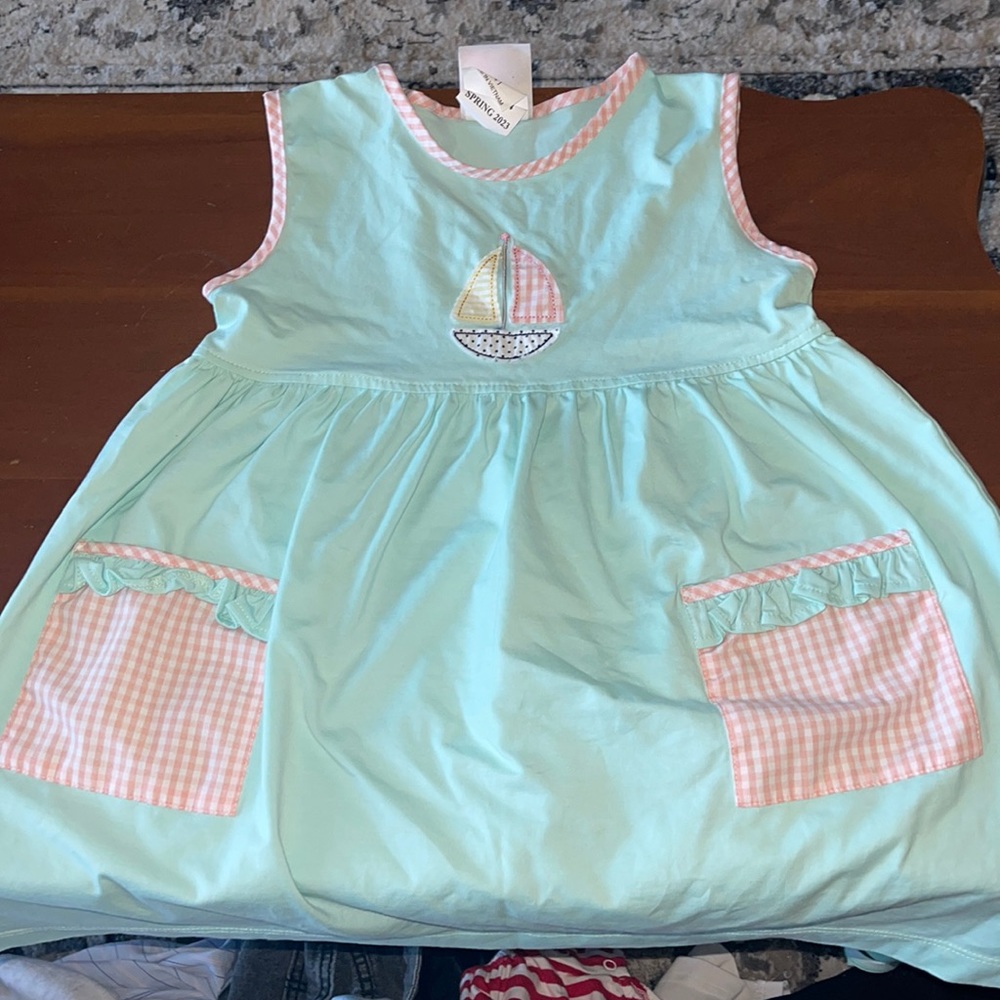 Little girls sailboat dress with pockets.
